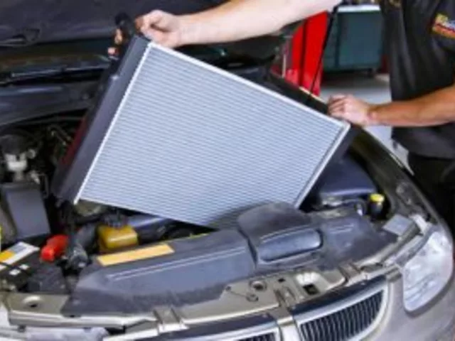 What are the consequences of not cleaning a car's radiator?